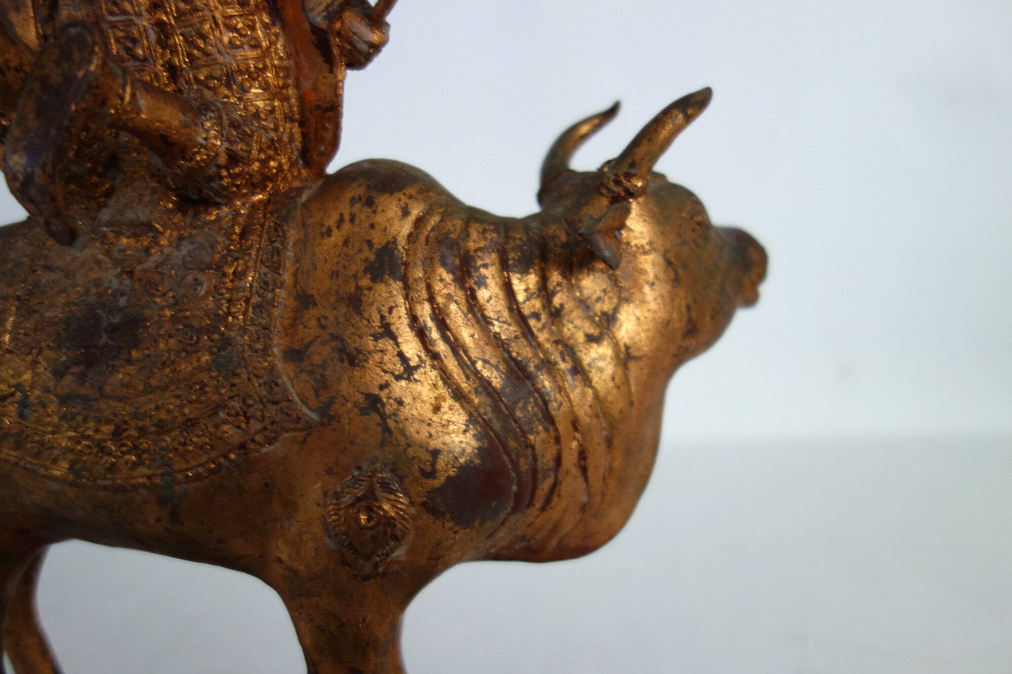 Golden bronze statue of Shiva on Nandi, India, mid-20th century.