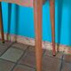 Vintage bistro table with compass legs, formica, beech, 50 x 70.