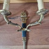 Pair of Empire style wall sconces in gilded bronze and green lacquer.