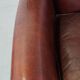 Sheep leather armchair correctly finished with decorative nails