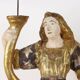 Antique wooden lacquered angel-shaped candlesticks, 18th century.