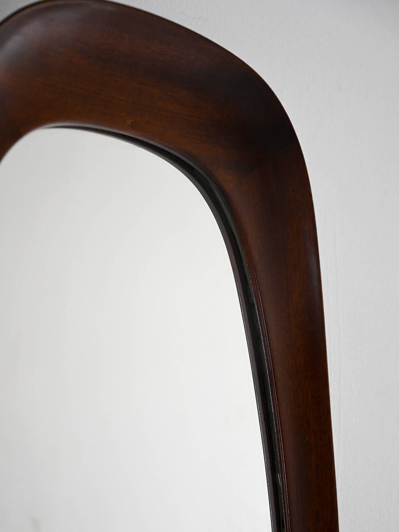 Scandinavian vintage mirror with curved mahogany frame