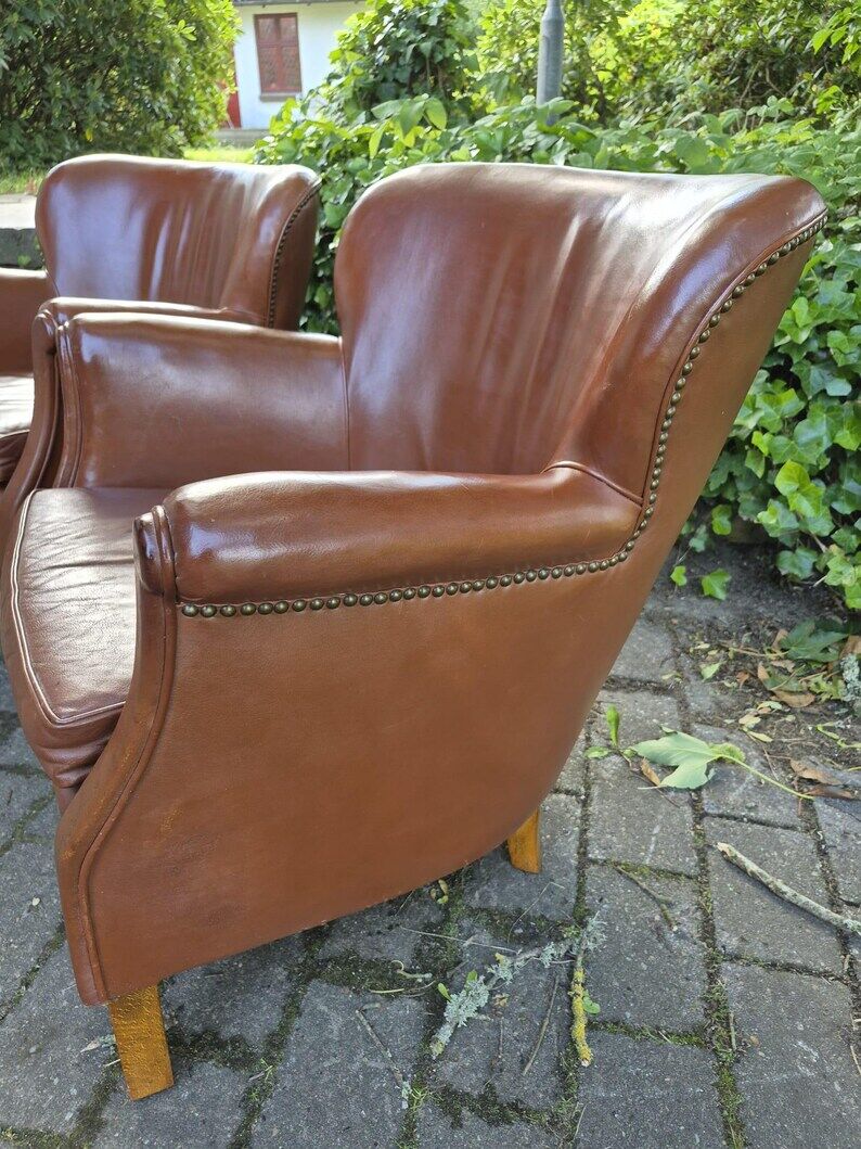 Chaises longues en cuir, design danois. Style urbain moderne.