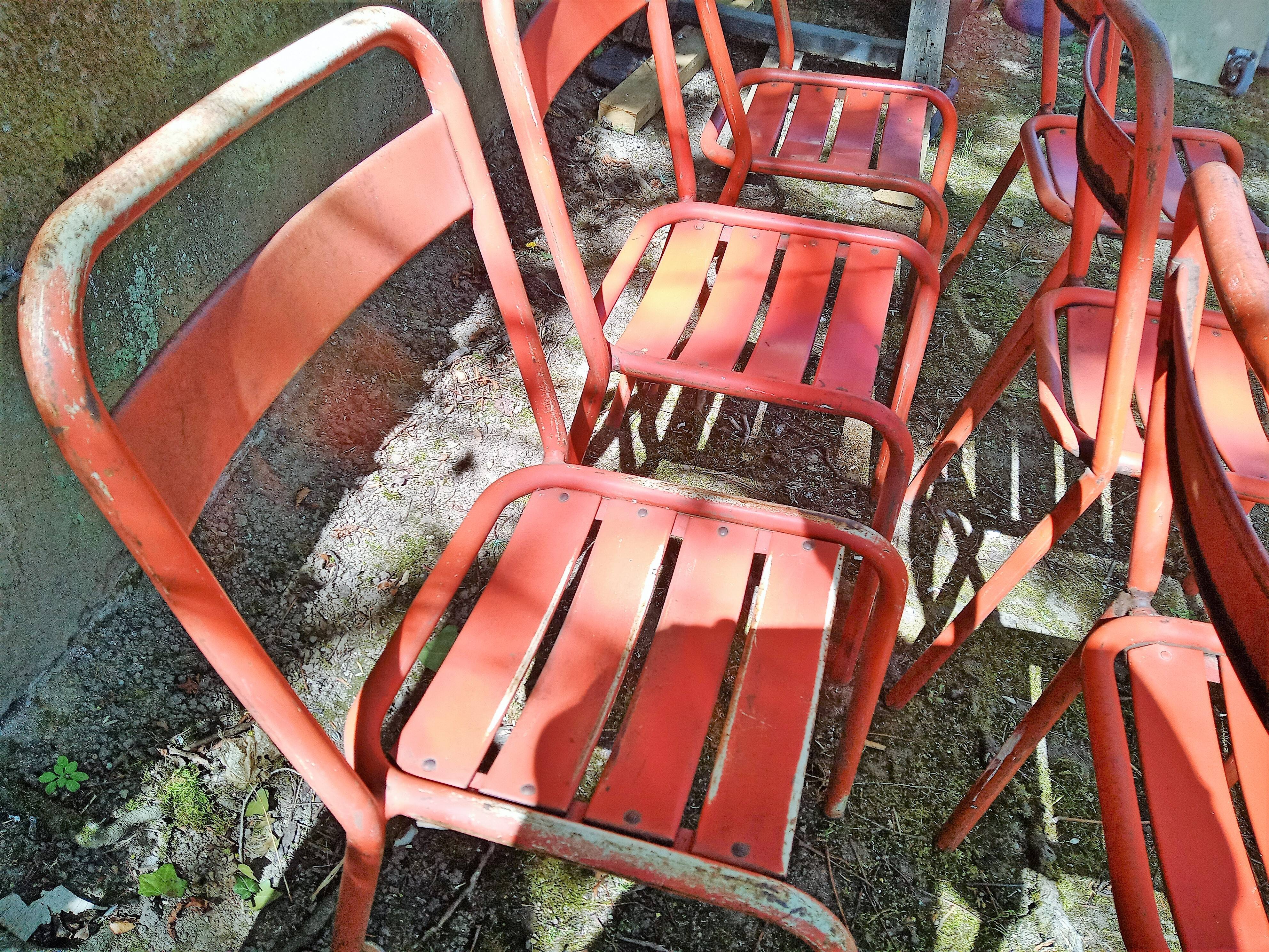 Series of 8 red Tolix chairs