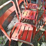 Series of 8 red Tolix chairs