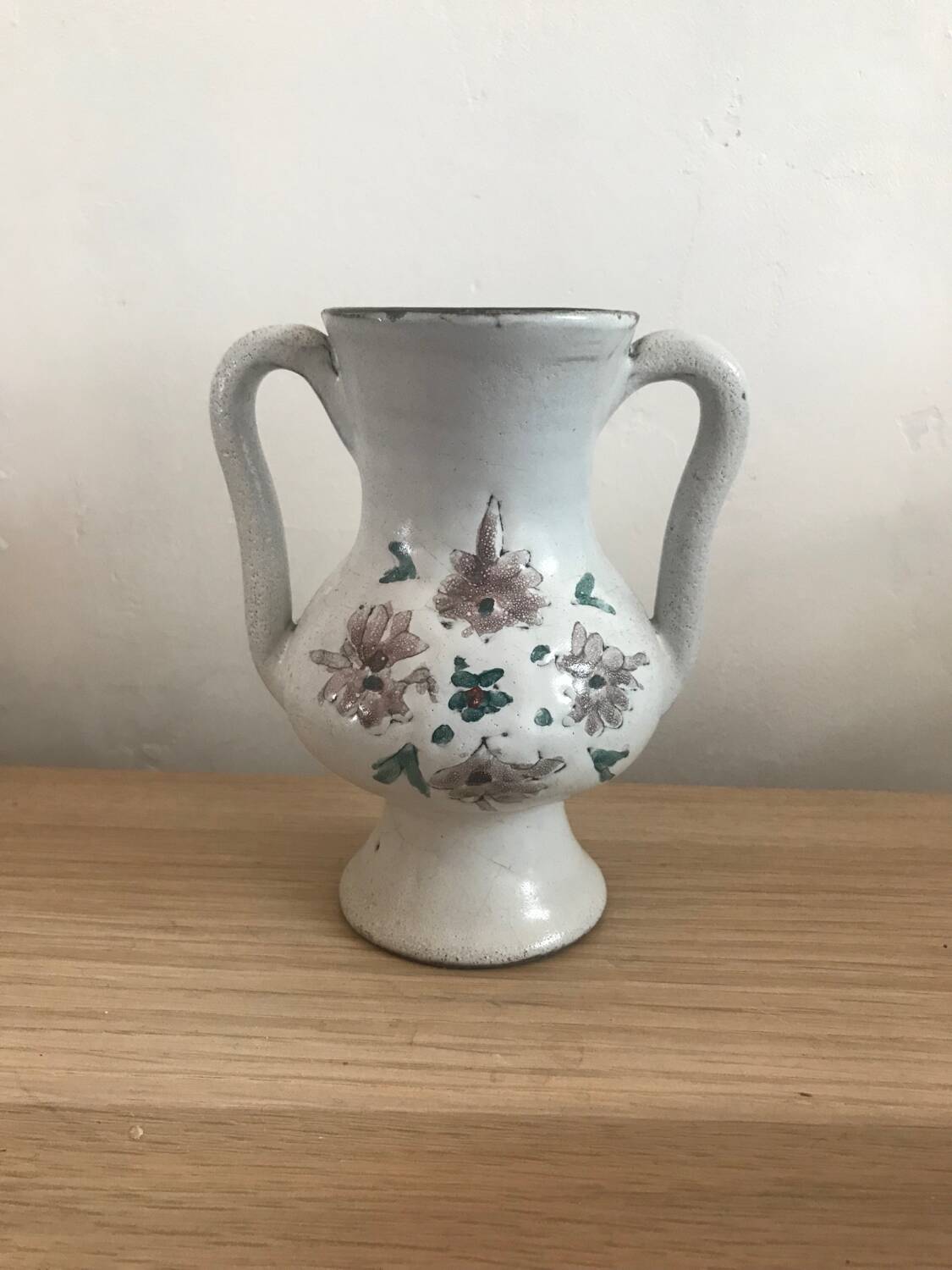Small stoneware vase with handles and floral motifs Enameled In very good condition