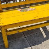 Old yellow teak school bench