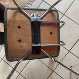 Pair of green faux leather chairs