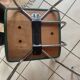 Pair of green faux leather chairs
