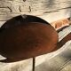 Metal ashtray shaped snail on foot tumble type