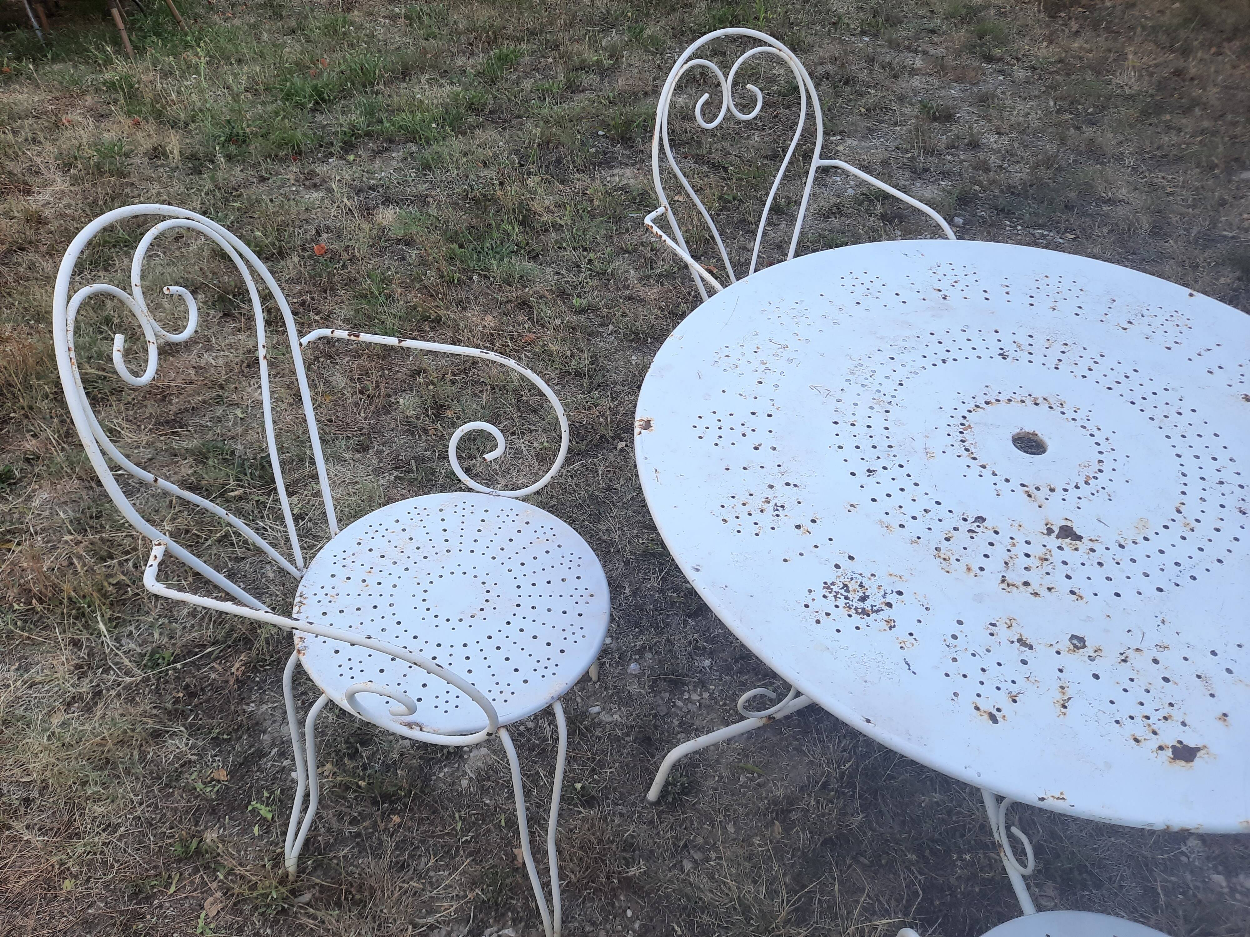 Antique wrought iron garden furniture