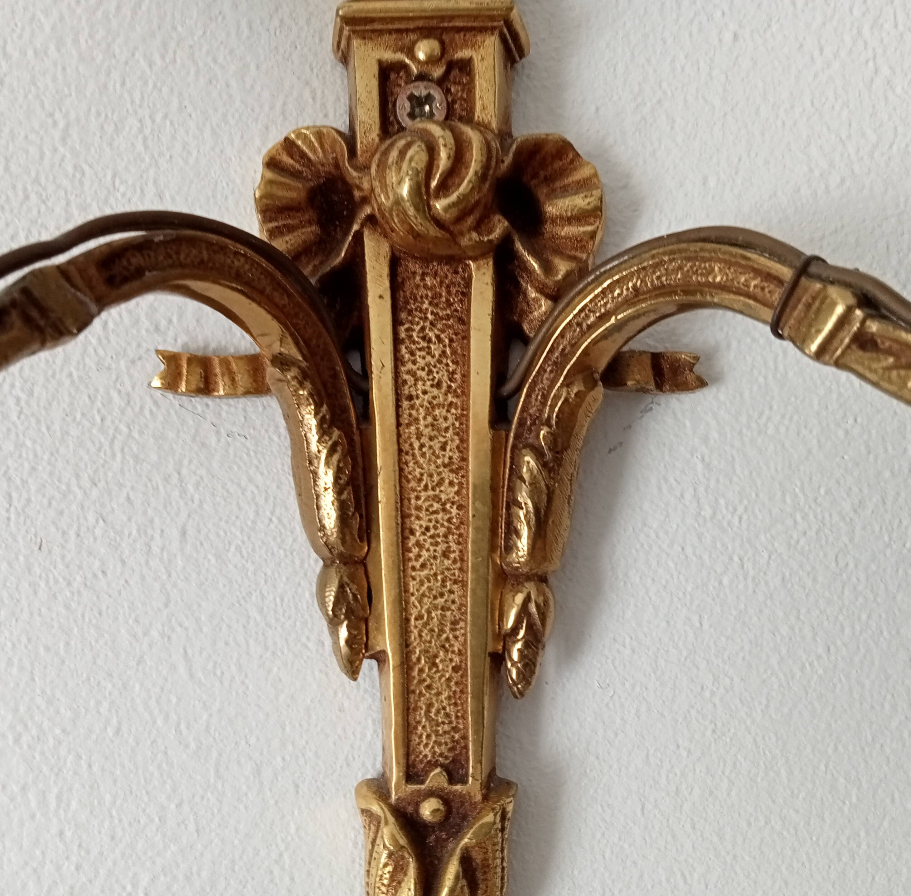 Vintage wall sconce in gilded brass, Empire style.