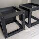 Chinese side tables in black lacquer, stone top.