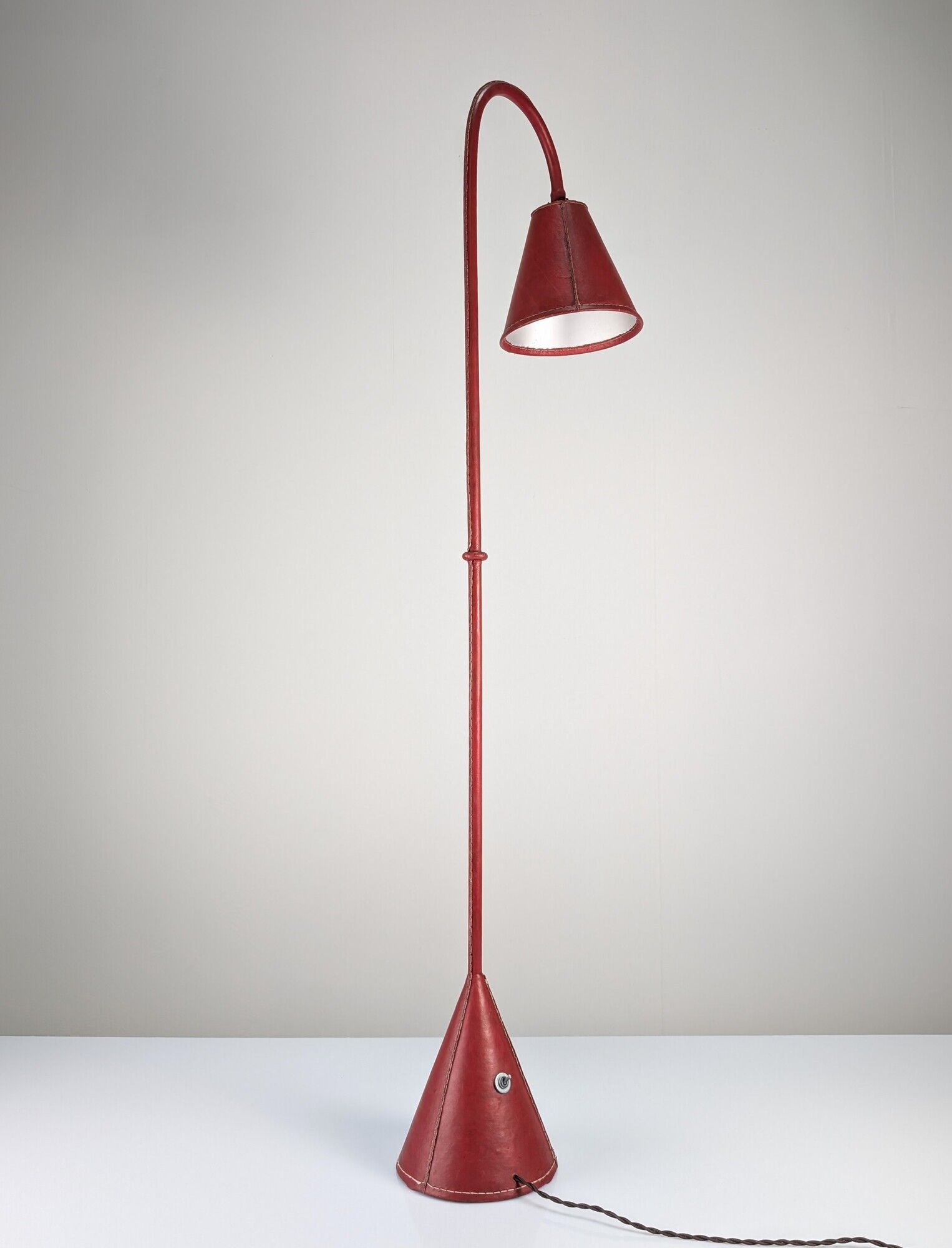 Jacques Adnet floor lamp in red leather, mid-century modern, France, 1960s