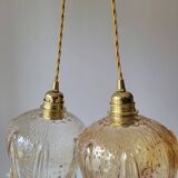 Trio of amber glass pendant lights