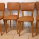 Set of 4 vintage chairs in solid beech and caramel faux leather.