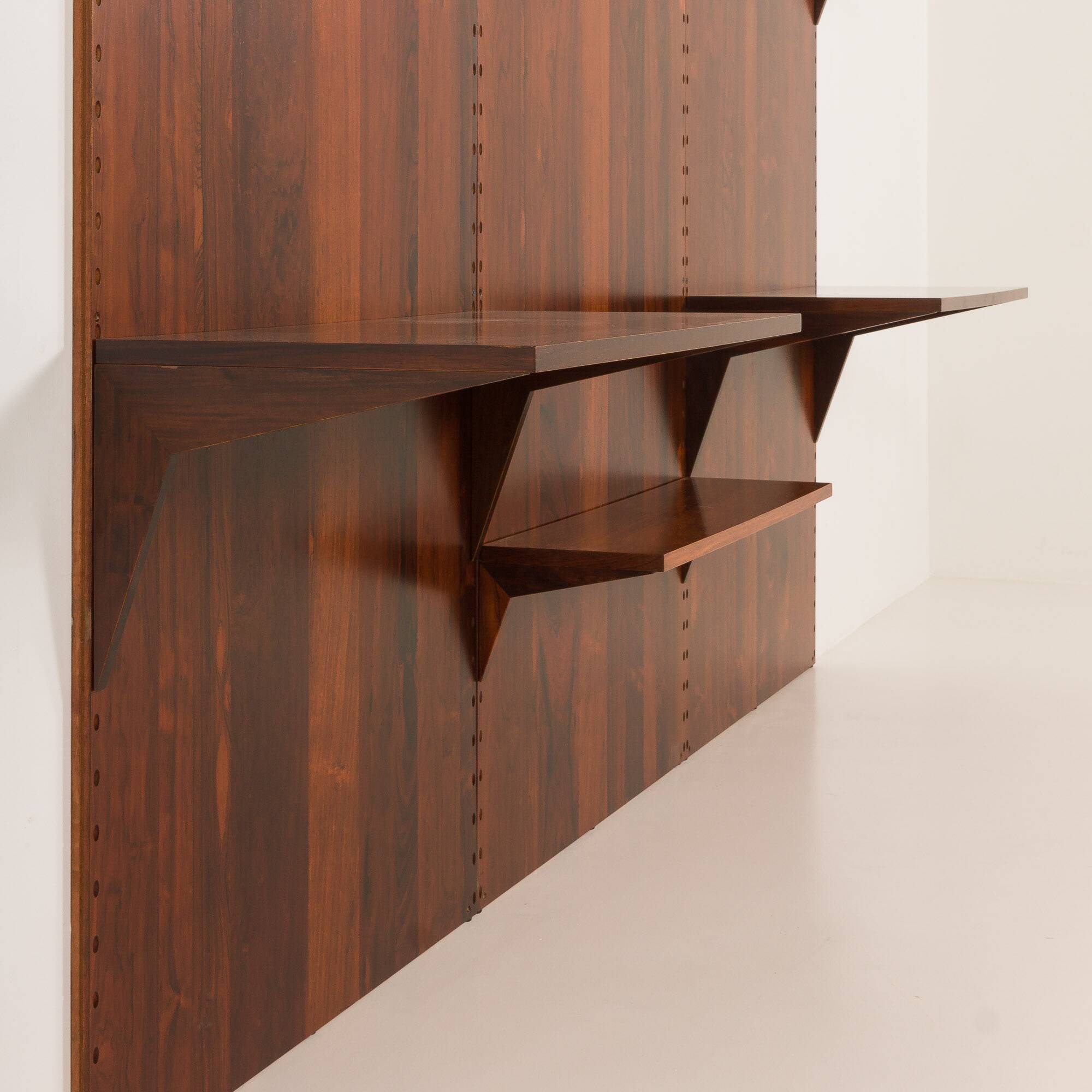 Poul Cadovius rosewood wall unit on panels for Cado, Denmark 1960s