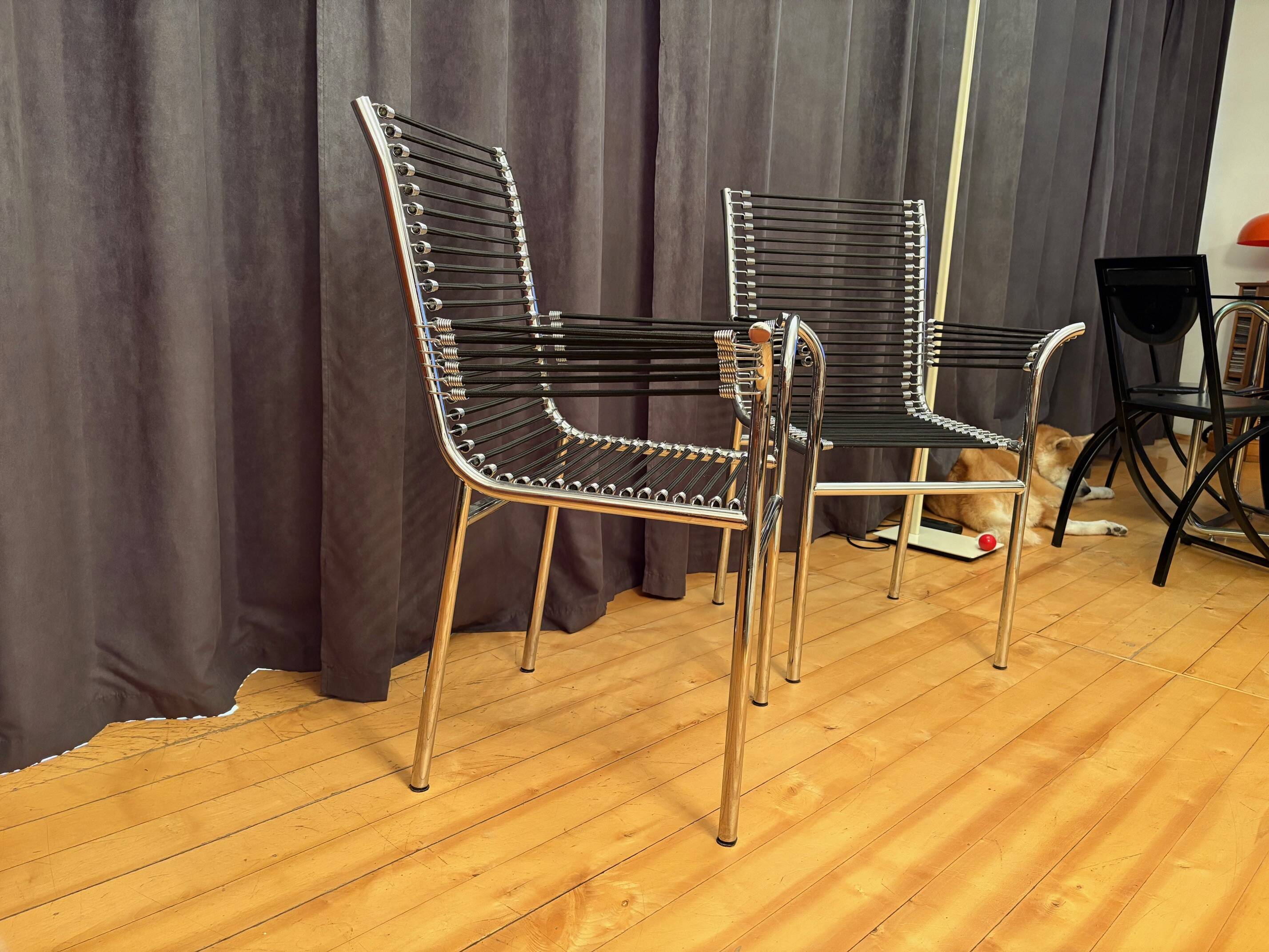 Pair of "Sandows" chairs designed by Rene Herbst, Bauhaus, France, 1980s