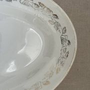 Antique oval plate Moulin des Loups Orchies – grey and gold floral decoration