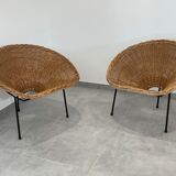 Pair of rattan and black metal armchairs, 1950s/60s
