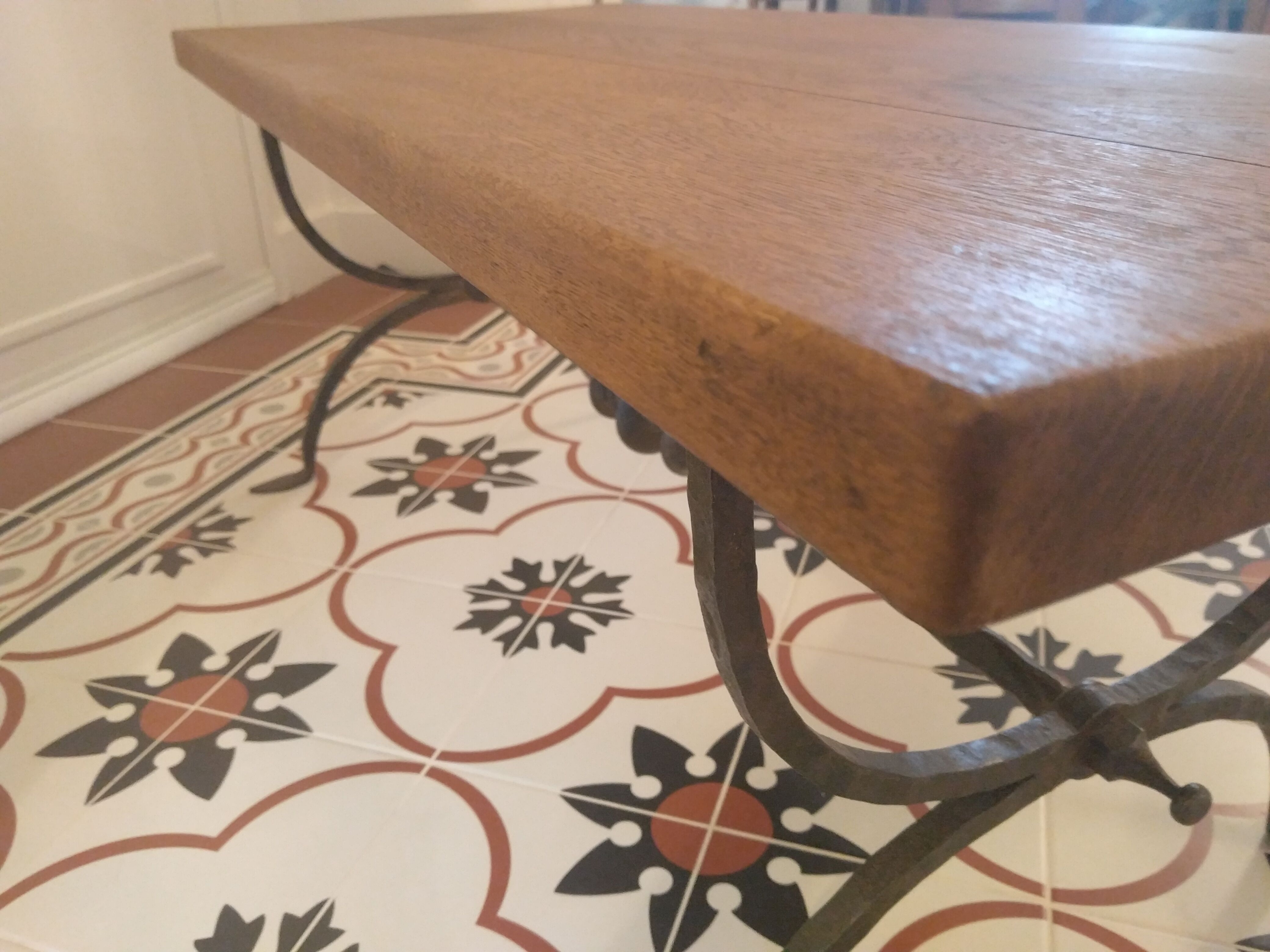 Coffee table, wooden top, wrought iron legs