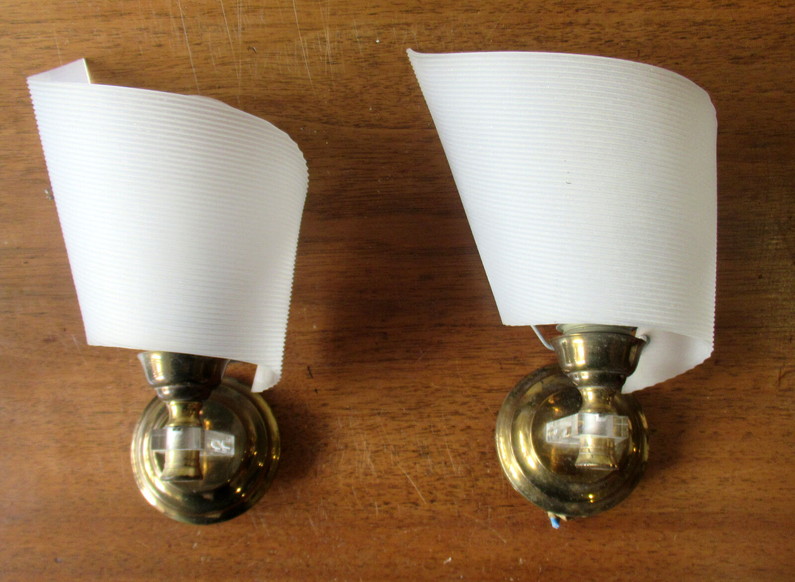 Pair of sconces, brass and plastic