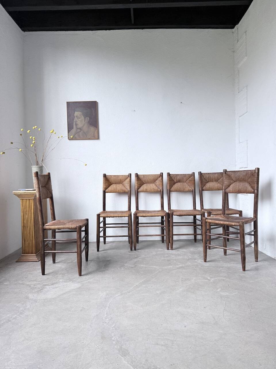 Set of 6 straw and oak Beauche chairs.