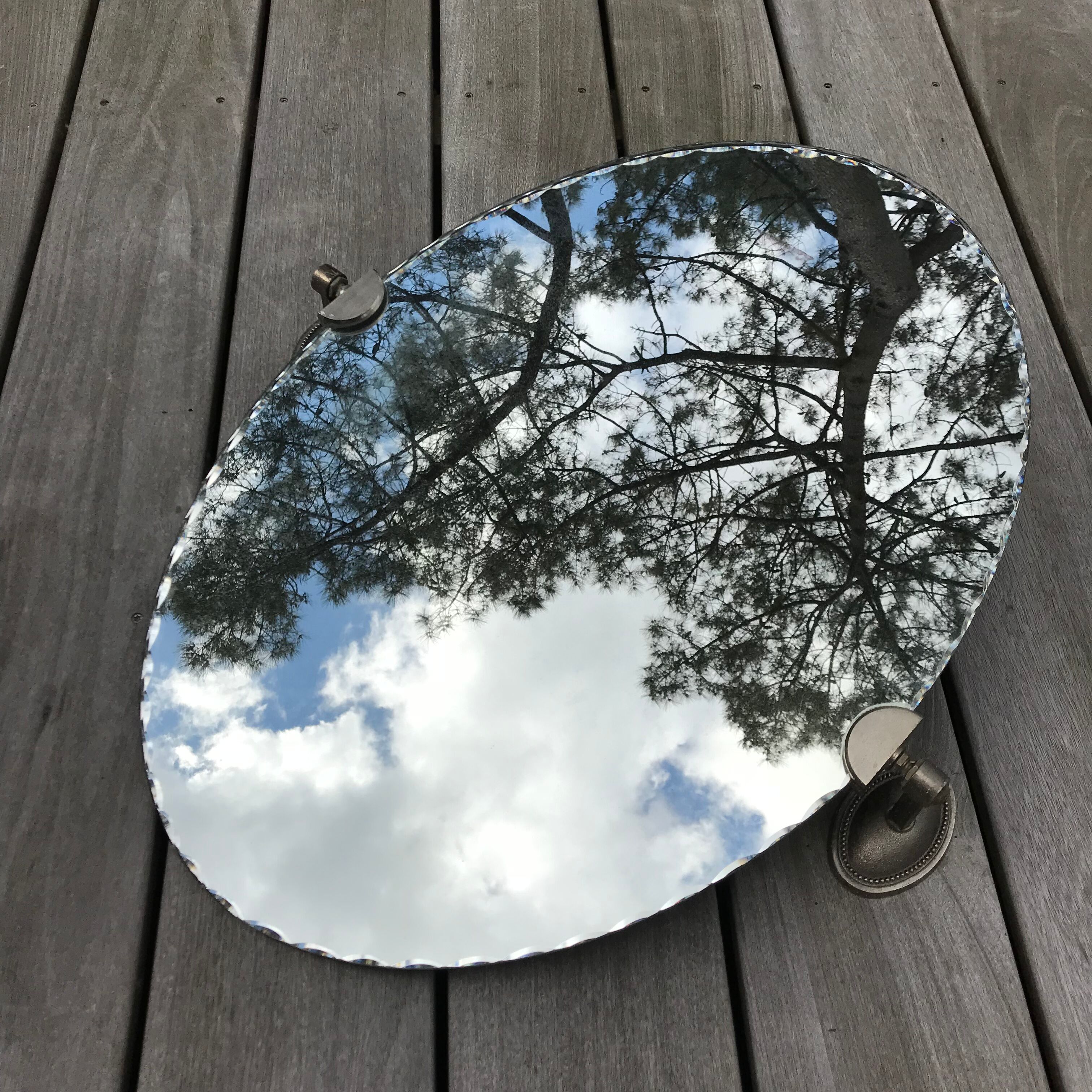 Oval mirror bevelled with removable metal media 43x60cm