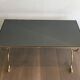 Neoclassical brass style coffee table with dolphin head decoration