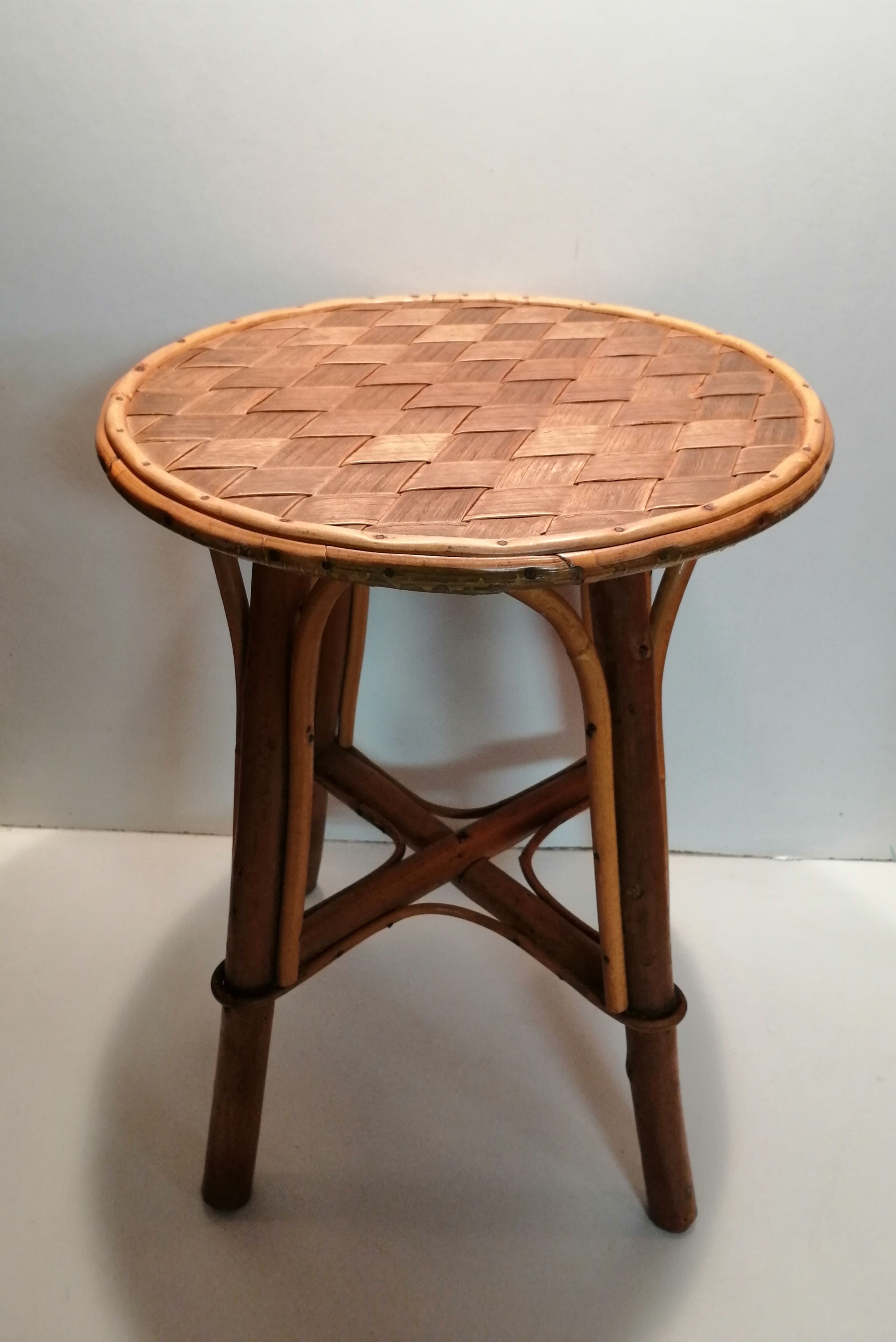 Rattan stool and braided chestnut