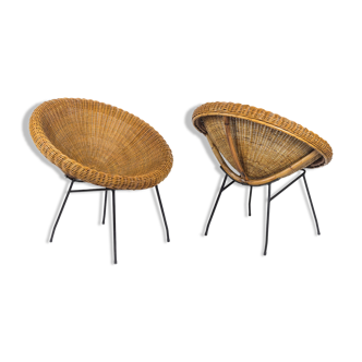 Paire de fauteuils soleil en rotin et métal noir, années 1950