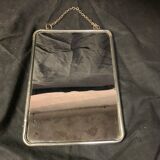 Old barber mirror with chain