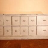 Solid wood sideboard with drawers.