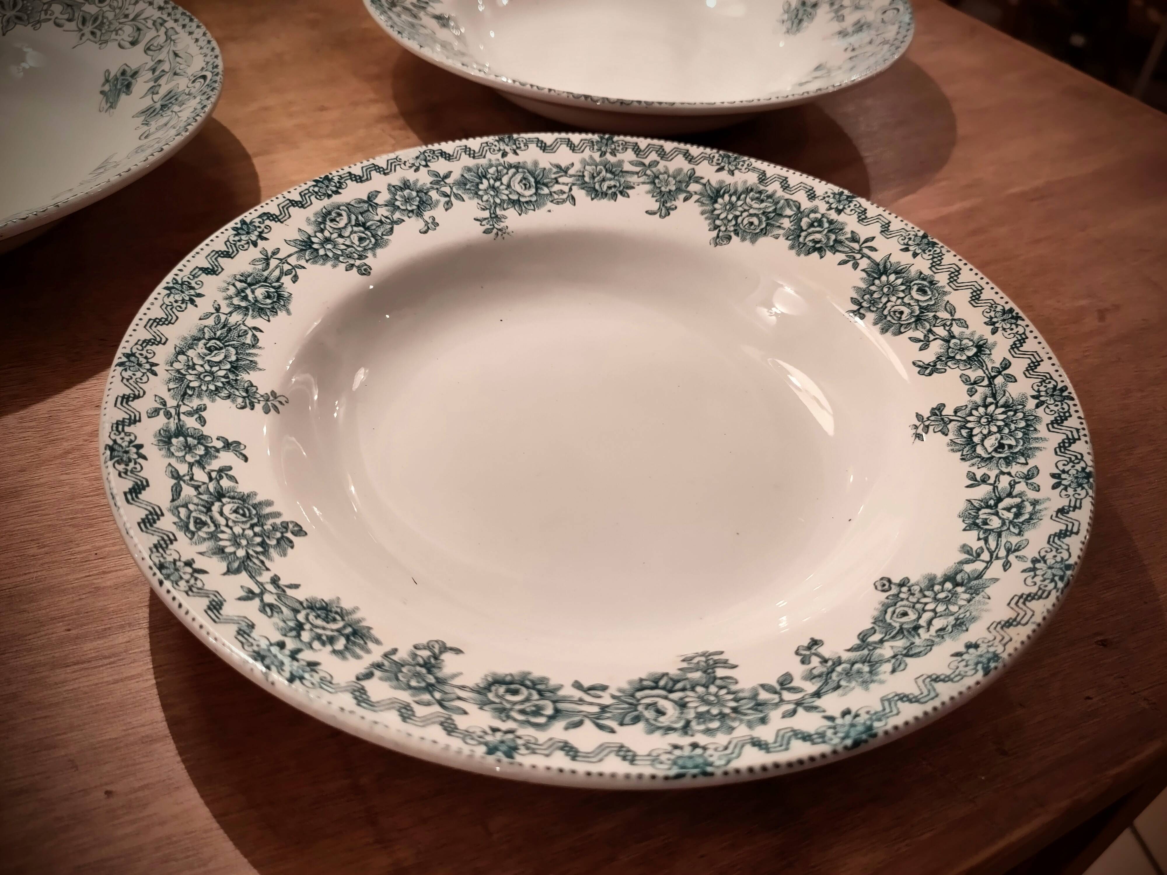 Four Saint Amand plates