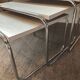 Trio of vintage nesting tables in Formica and chrome metal