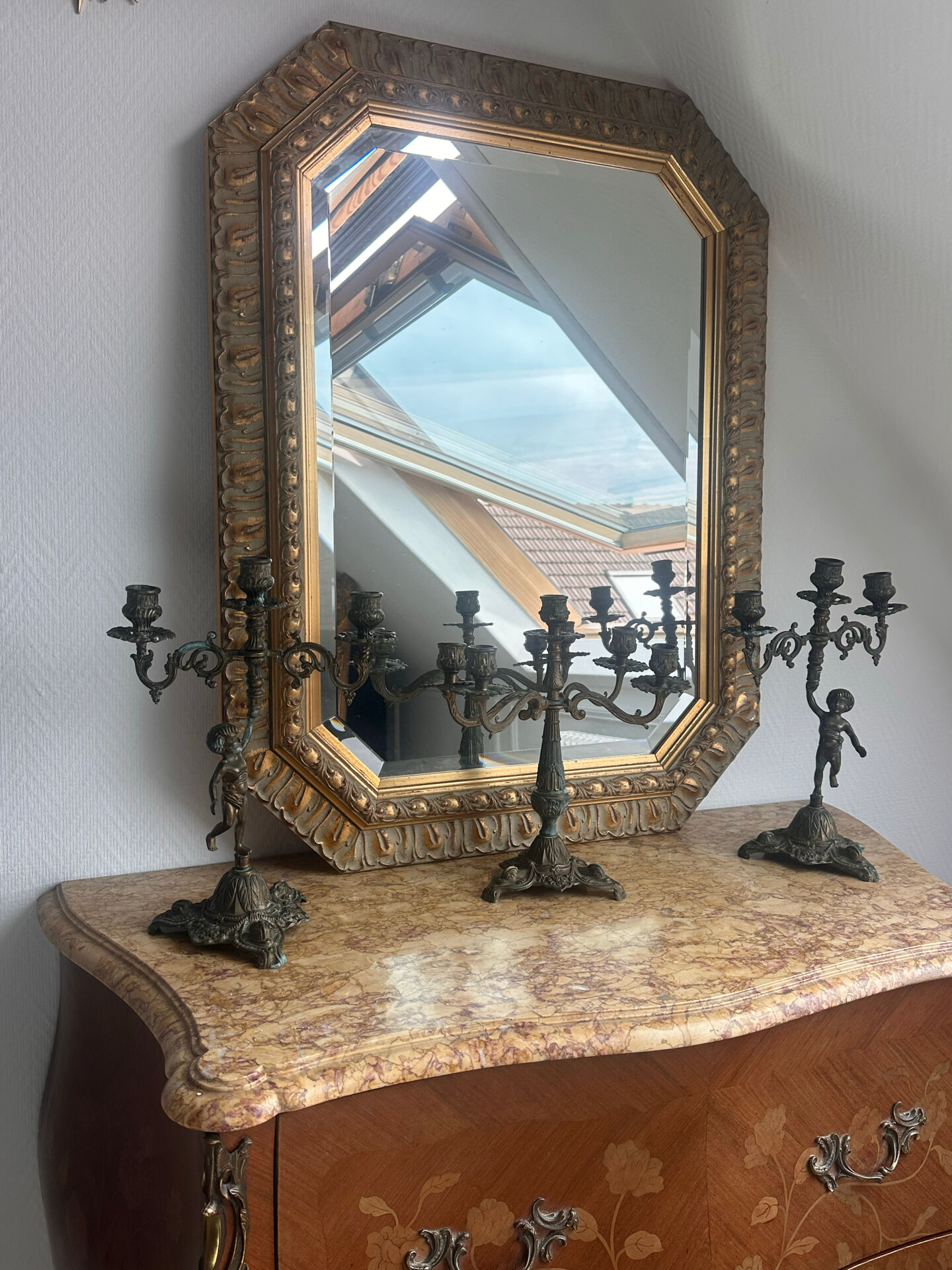 Set of 3 antique three-branch candelabras with cherubs and bronze patina.