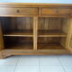 Very much in solid walnut, 3 doors.