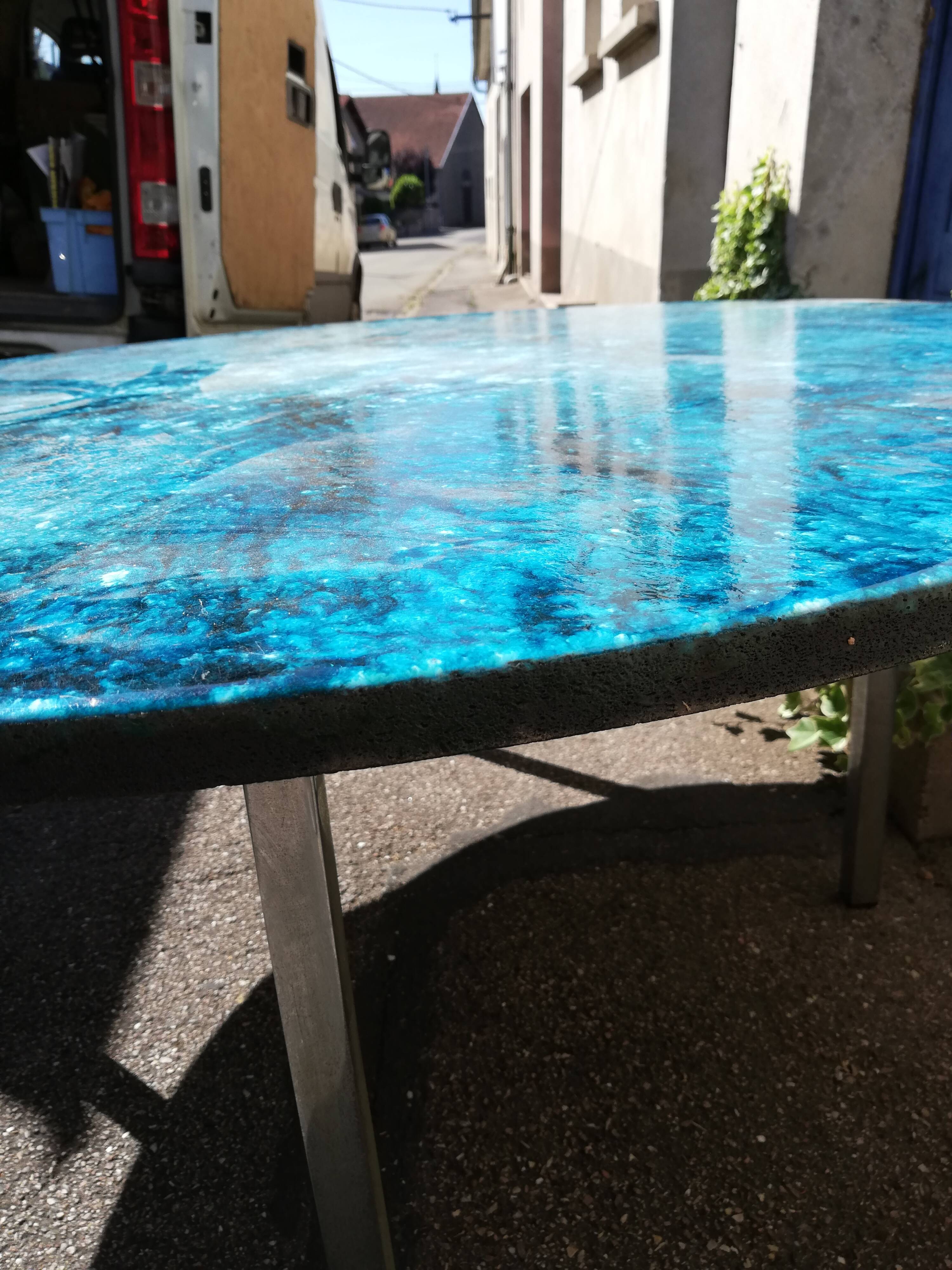 Blue enamelled lava stone coffee table