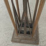 Column 1930 with one foot in wrought iron