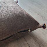 Moroccan brown cushion with cotton pompom