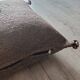 Moroccan brown cushion with cotton pompom