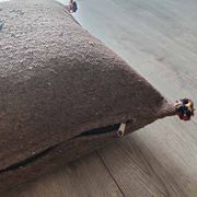 Moroccan brown cushion with cotton pompom