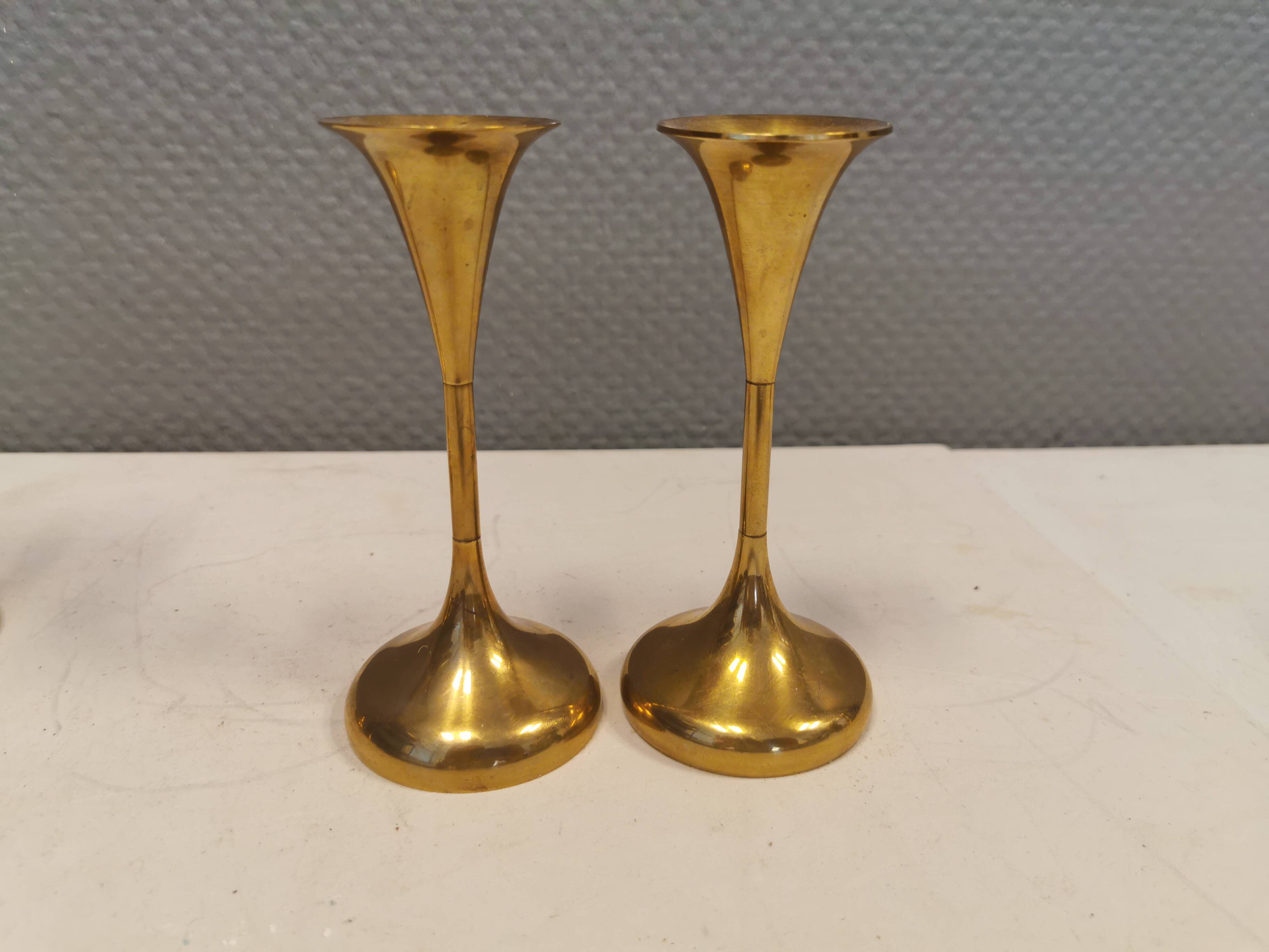 Danish designed candle holders in solid brass.