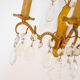Pair of golden sconces with tassels