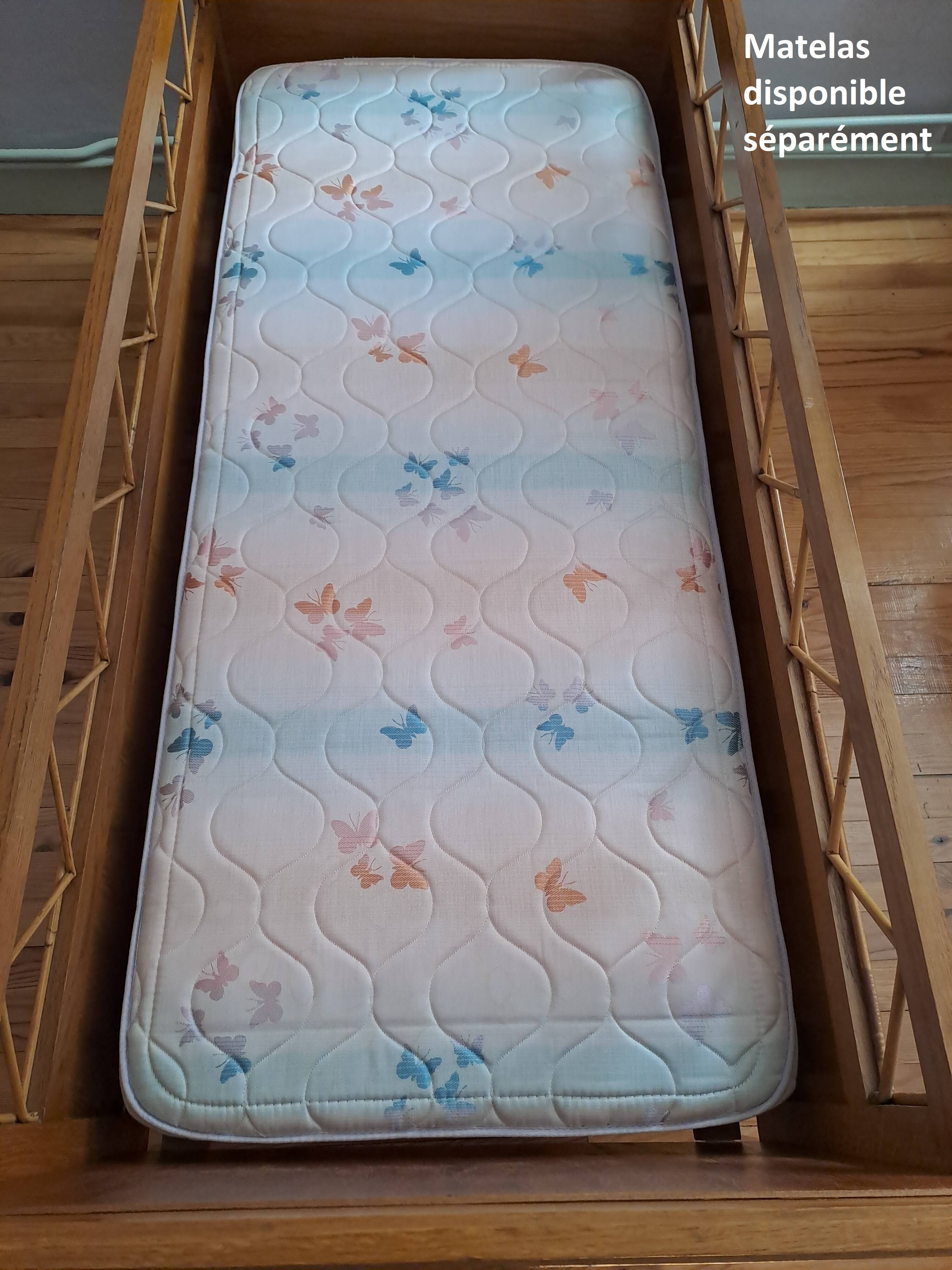 Solid wood and rattan baby bed from the 1960s