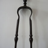 Old wrought iron fireplace clamp