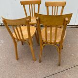 Curved varnished bistro chairs