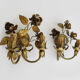 Pair of gilded metal sconces decorated with flowers and foliage. Year 60