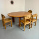 Extendable round table Maison Regain in solid elm, 1970s design.