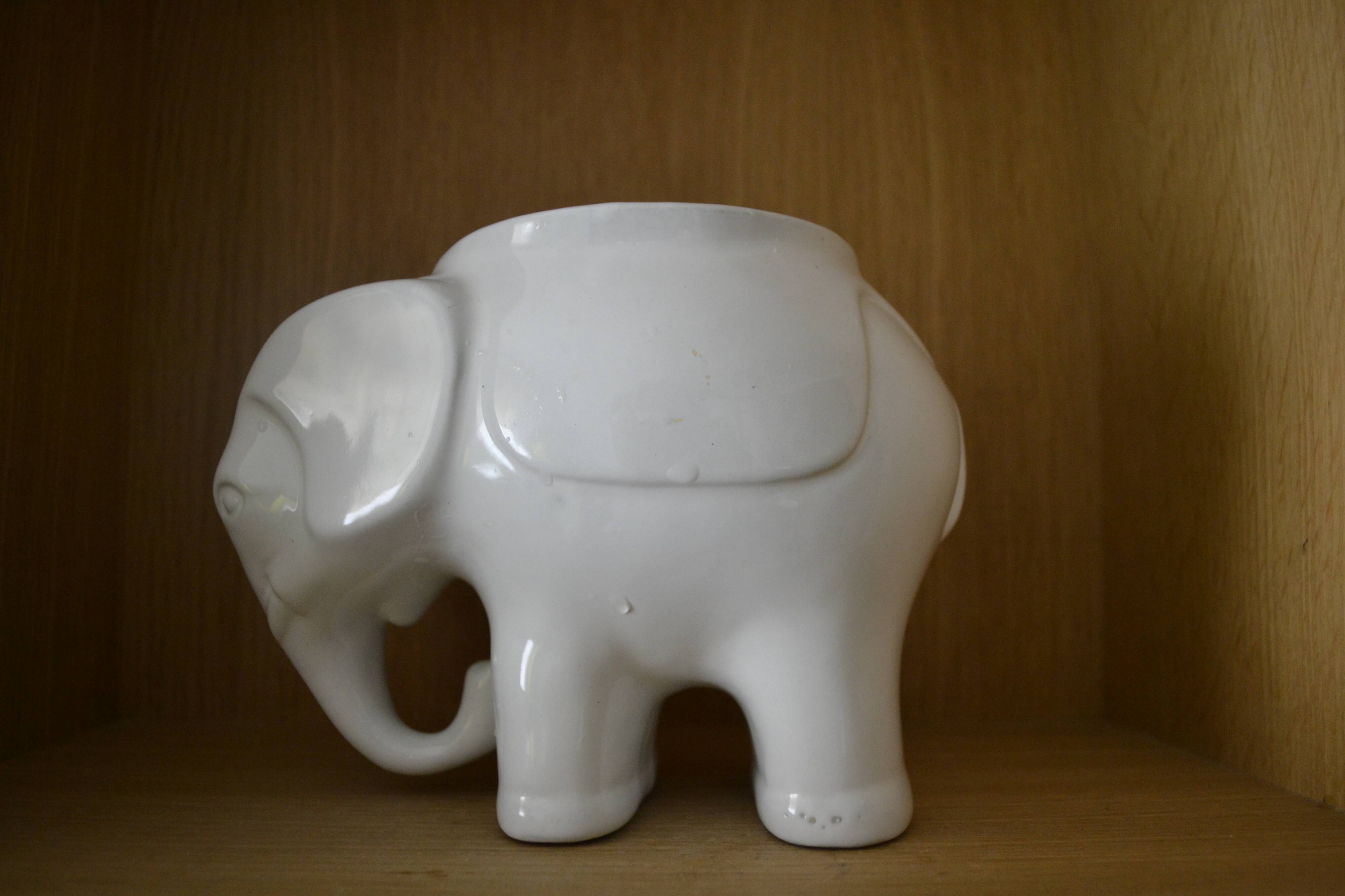 White elephant pot cover